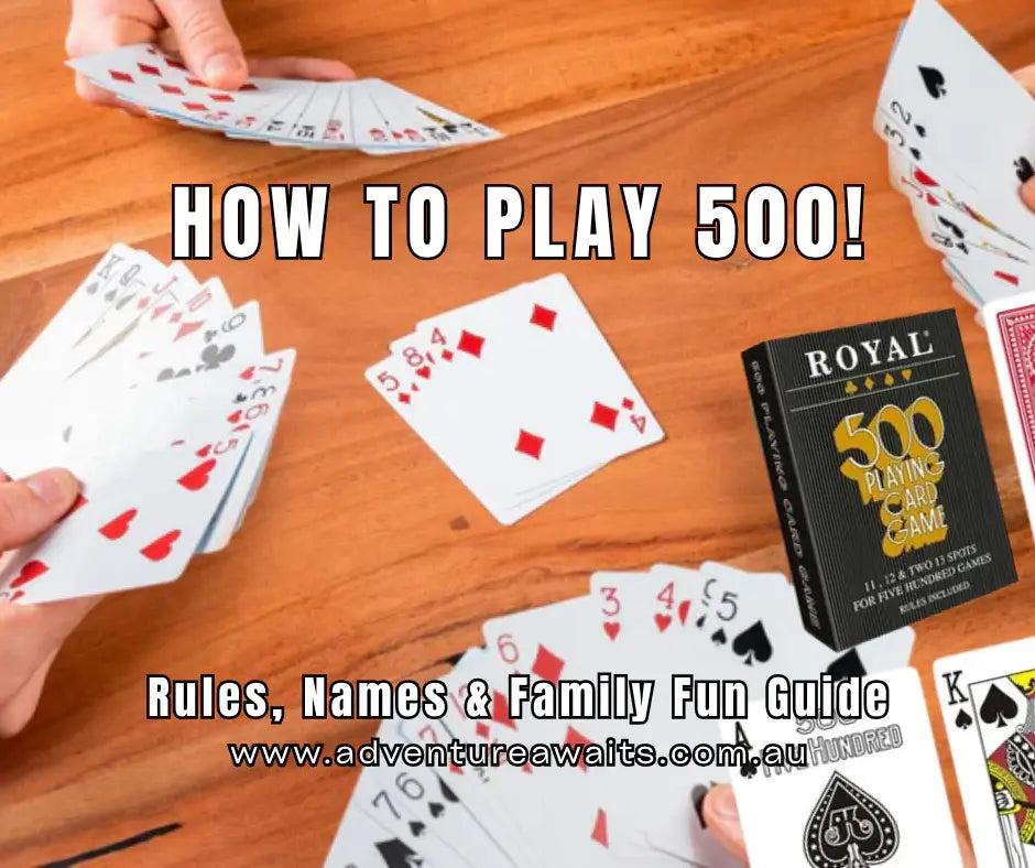 Hands playing a game of 500 cards on a timber table with a Royal 500 Playing Card Game box — Adventure Awaits family fun guide