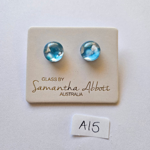 Pair of blue glass earrings on a branded card with 'Samantha Abbott' branding.
