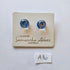 Pair of blue glass earrings on a branded card with 'Samantha Abbott Australia' on a white background.