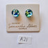 Pair of glass earrings on a branded card with 'Samantha Abbott Australia' text.