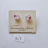 Pair of glass earrings on a branded card with 'Glass by Samantha Abbott' text.