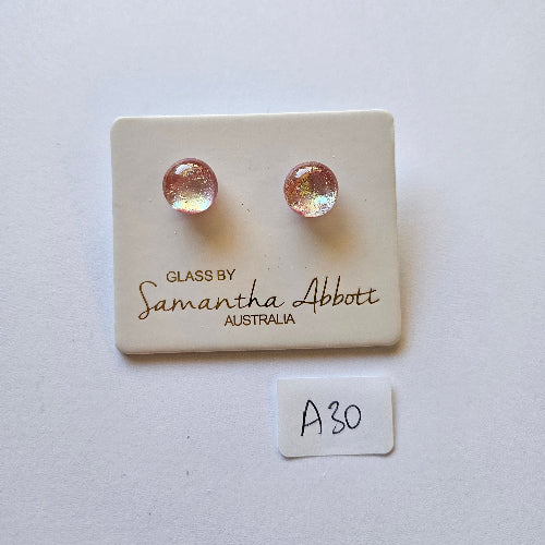Pair of glass earrings on a branded card with 'Samantha Abbott' on a white background