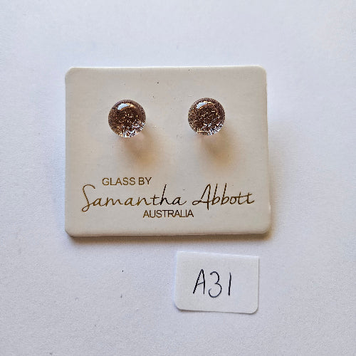 Pair of earrings on a Samantha Abbott card with a white background