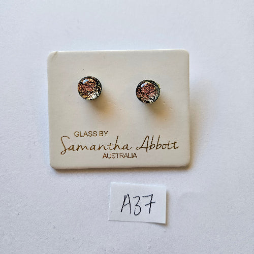 Pair of earrings on a branded card with 'Samantha Abbott' on a white background