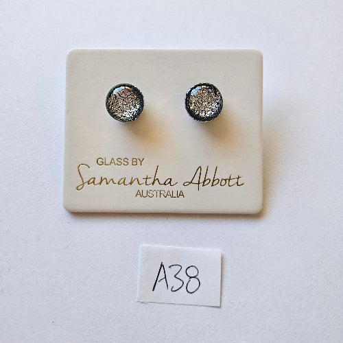 Samantha Abbott silver glass stud earrings displayed on white card in store