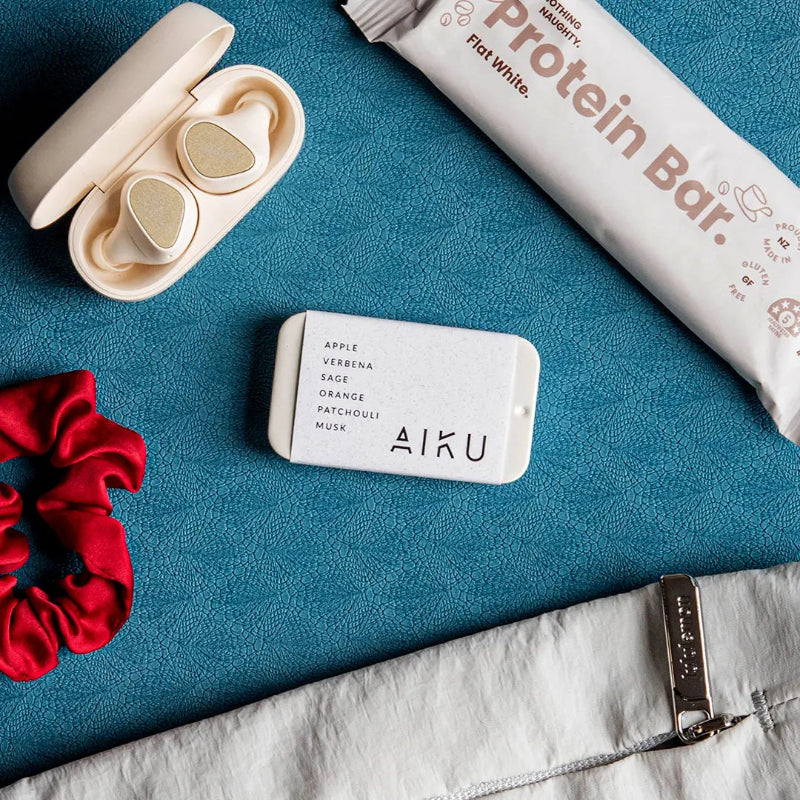AIKU tin of solid perfume in Sherbet with apple, verbena, sage, orange, bergamot and musk notes — Adventure Awaits