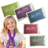 Adventure Awaits cooling towels in blue, purple, green, pink and grey, displayed alongside a smiling child wearing a purple cooling towel around her neck.