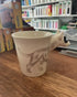Cream bull terrier mug with illustrated dog body and sculpted head handle — Adventure Awaits