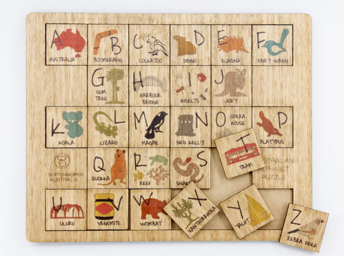 Australian alphabet timber puzzle with removable A-Z tiles, native animals and landmarks — Adventure Awaits