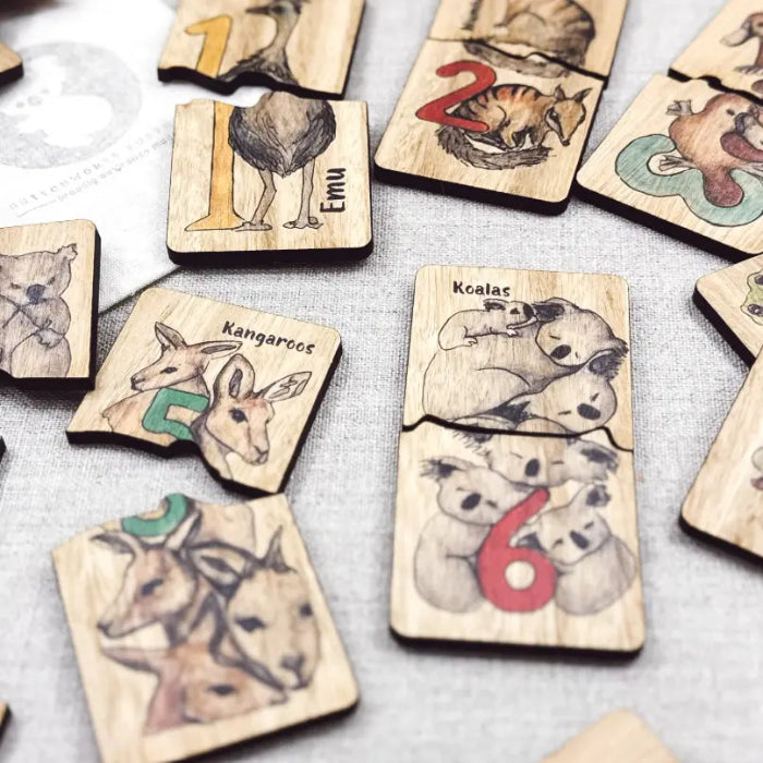 Close-up of Australian animal number matching timber puzzles with koalas, kangaroos and emu — Adventure Awaits