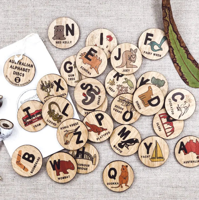 Australian alphabet timber discs with native animals, landmarks and drawstring bag — Adventure Awaits