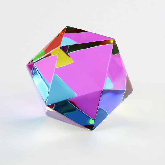 CMY Cube The Motus with vivid pink, blue and yellow geometric reflections, Adventure Awaits