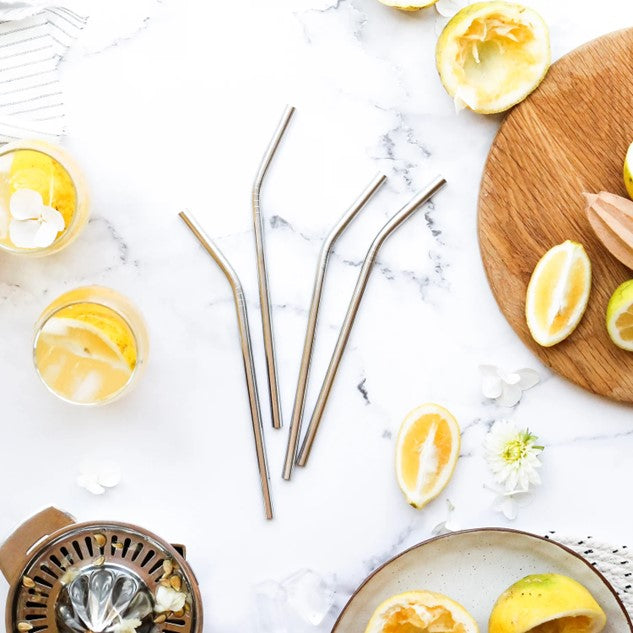 Ever Eco stainless steel smoothie straws beside lemon drinks on marble bench — Adventure Awaits