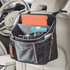 driverstash car organiser on back of beige leather car seat for back seat passengers use