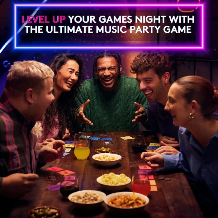 Friends laugh around a table while playing the Hitster music party game — Adventure Awaits