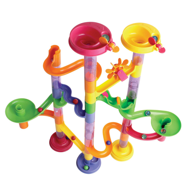 Colourful assembled marble run with towers, funnels, curved tracks and marbles — Adventure Awaits