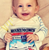 A child with Jo and Nics Crinkly Cloth Baby Books.