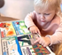 A child playing with Jo and Nics Crinkly Cloth Baby Books