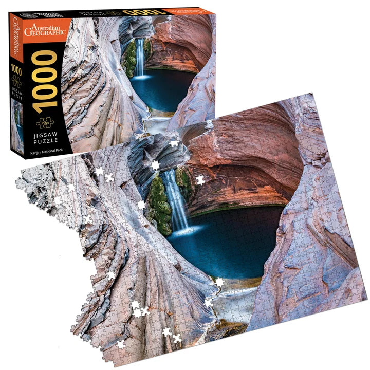 Australian Geographic Karijini National Park 1000-piece jigsaw puzzle partly assembled beside the box — Adventure Awaits