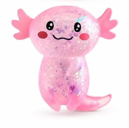 Pink glitter axolotl sensory toy with smiling face, pink gills and curved tail — Adventure Awaits