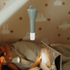 Adventure Awaits portable hanging LED night light glowing above children reading in a cosy bedroom