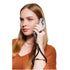 Woman holds a phone secured by a black wrist strap while taking a call, Adventure Awaits