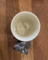 Top view of cream koala mug showing the sculpted koala and joey handle below — Adventure Awaits