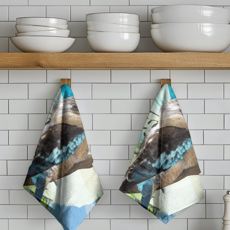 Two patterned towels hanging on a wooden shelf with white bowls.