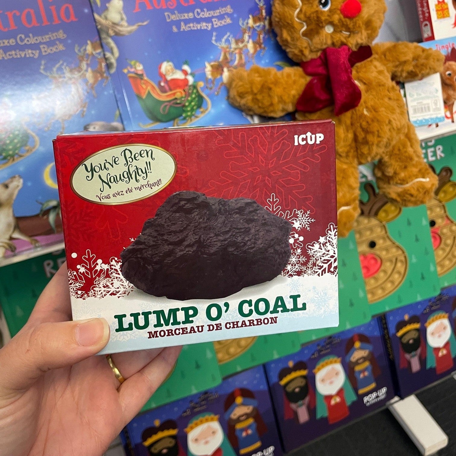 Toy lump of coal in box
