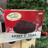 Toy lump of coal in box