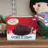 Toy lump of coal in box