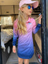Girl in a pink, purple and blue UPF50+ fishing dress with cap and sunglasses at a caravan — Adventure Awaits