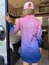 Back view of girl in a pink, purple and blue UPF50+ fishing dress with Mermaid Life print at a caravan — Adventure Awaits