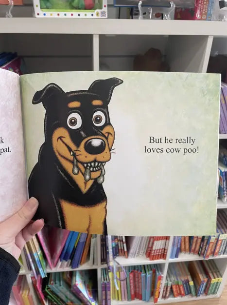 Mack Loves Cow Poo! kids book page with smiling farm dog saying he loves cow poo Adventure Awaits