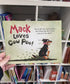 Mack Loves Cow Poo! back cover with farm dog running through cow poo Adventure Awaits