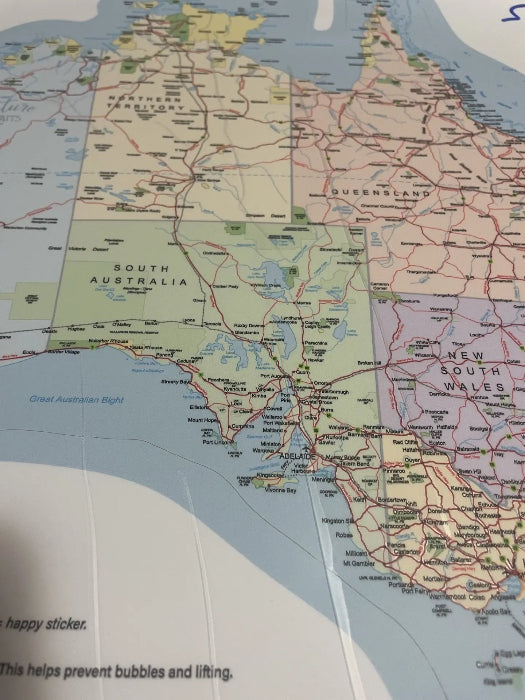 Close up of map of Australia sticker with bubbles.