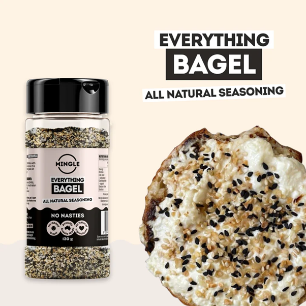 Mingle Everything Bagel all natural seasoning jar beside seeded toast — Adventure Awaits