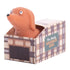 Mini stretchy sausage dog toy peeking out of plaid kennel box — Adventure Awaits