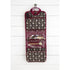 Hanging floral travel toiletry organiser with clear zip pockets and beauty accessories inside
