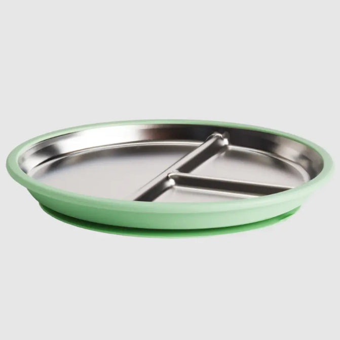 Low side view of a Nestling stainless steel divided plate with mint green silicone suction base, Adventure Awaits