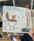 Nobody Likes Chookie Nip-Nip kids book page with chook in toilet beside Grandpa Adventure Awaits