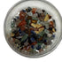 stones extracted from pick 'em silicone disc shown in plastic dish on white background