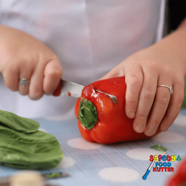 safety food kutter - large being used to cut capsicum
