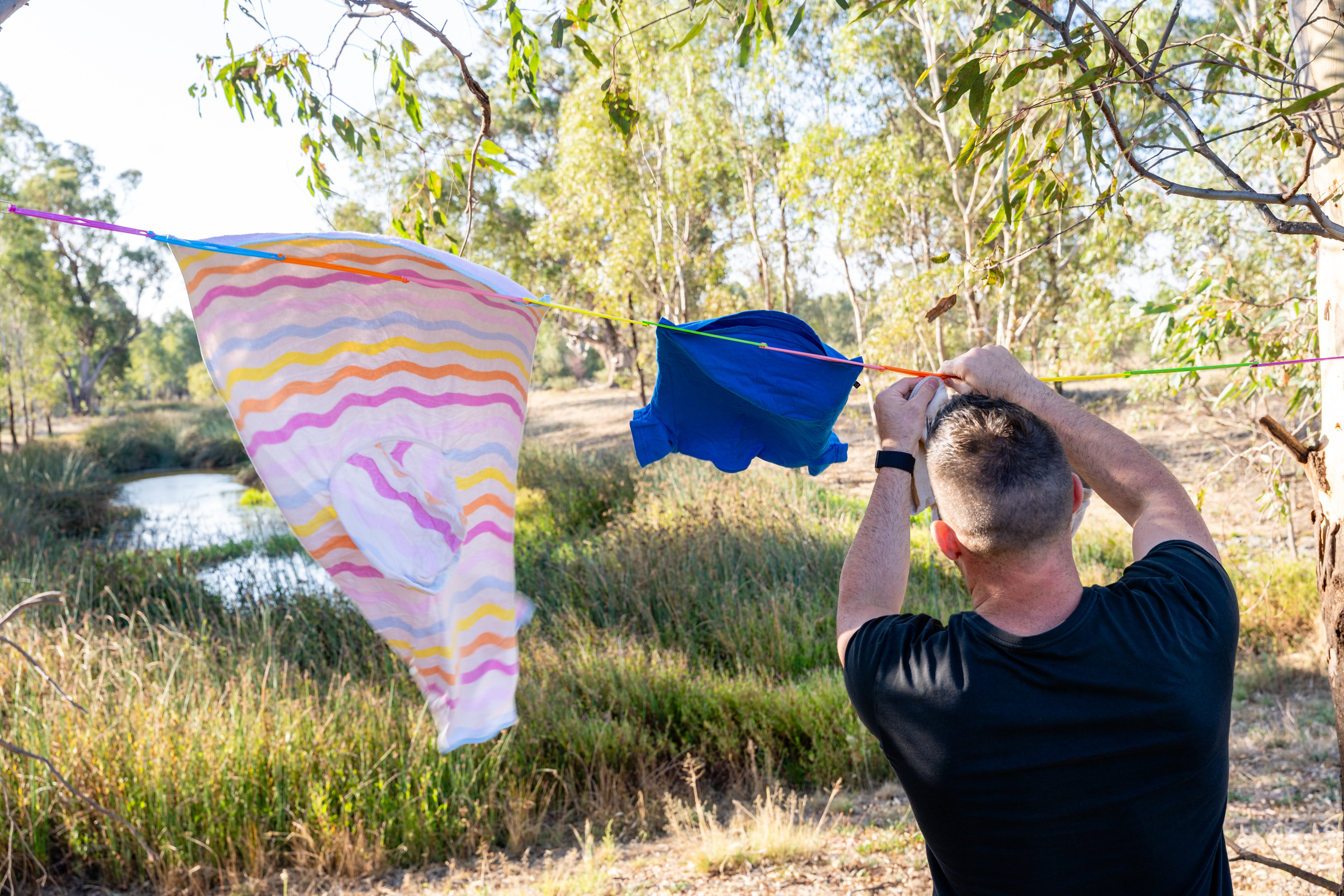 Slide n' Dry Pegless Clothesline | Ultimate Camping Clothesline Rainbow