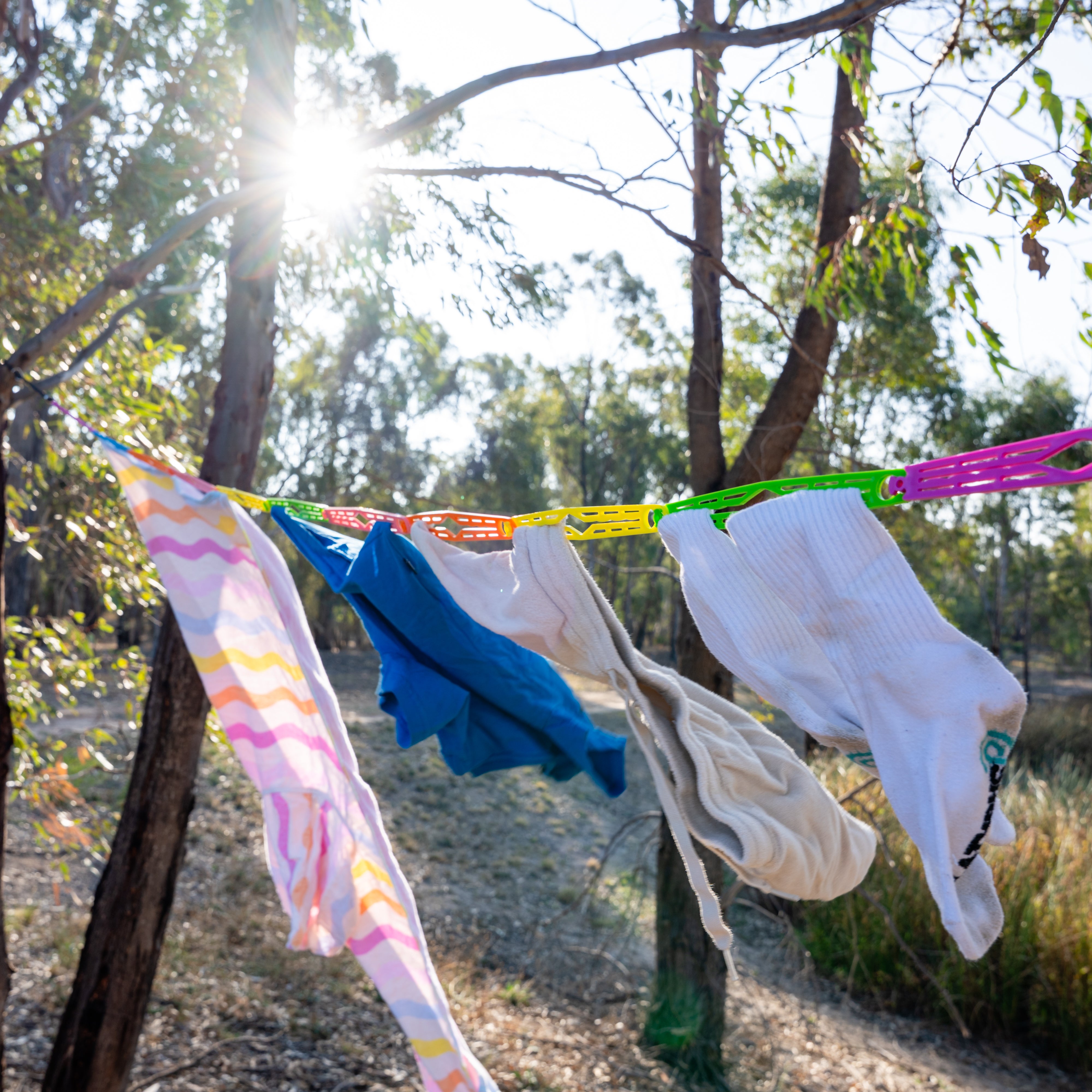 Slide n' Dry Pegless Clothesline | Ultimate Camping Clothesline Rainbow