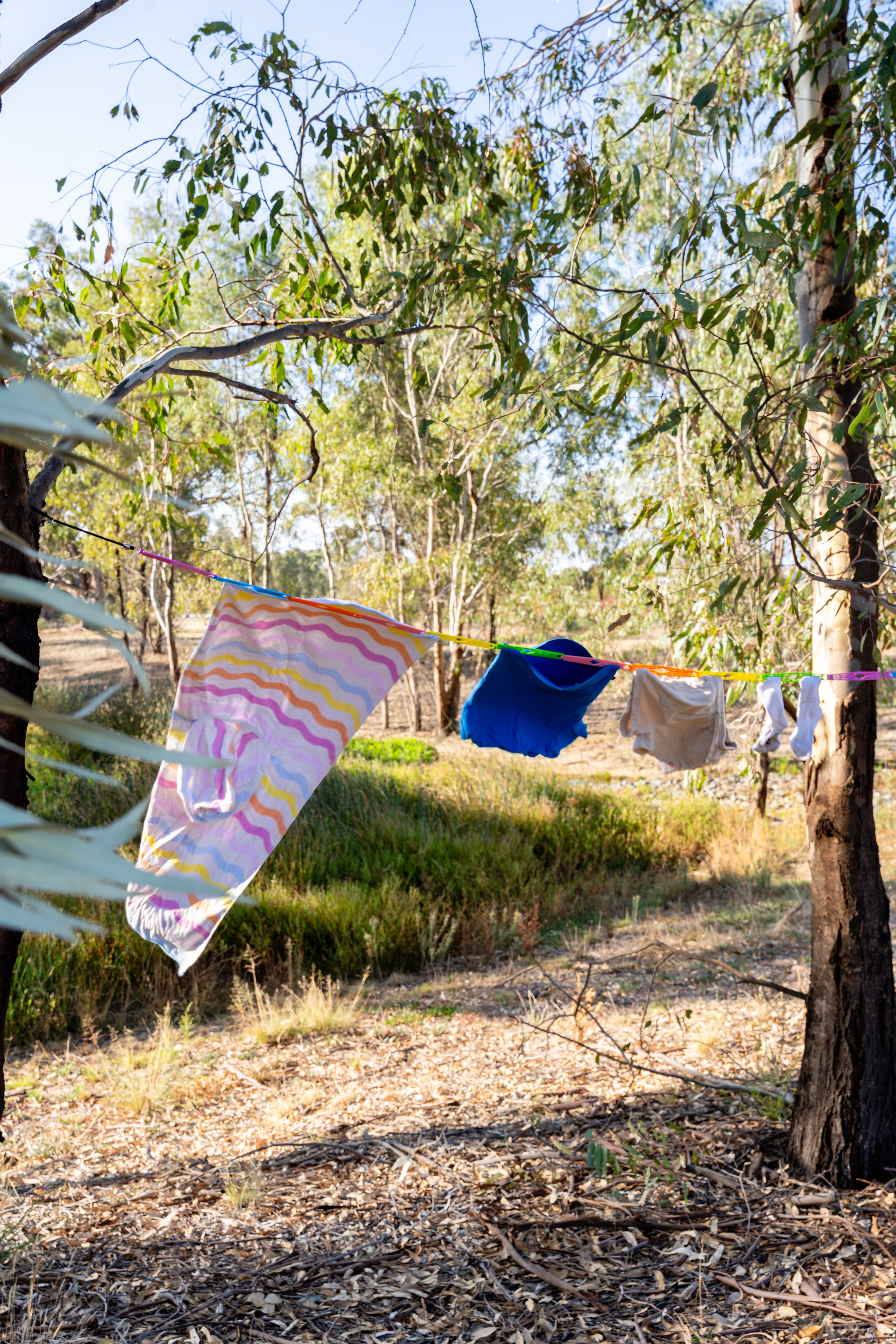 Slide n' Dry Pegless Clothesline | Ultimate Camping Clothesline Rainbow