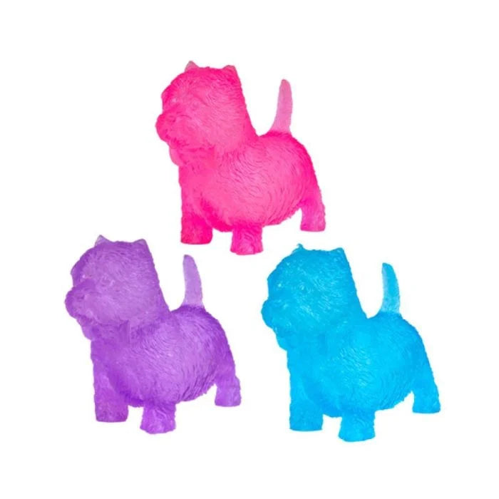 Three dog-shaped squishies in pink, purple, and blue on a white background