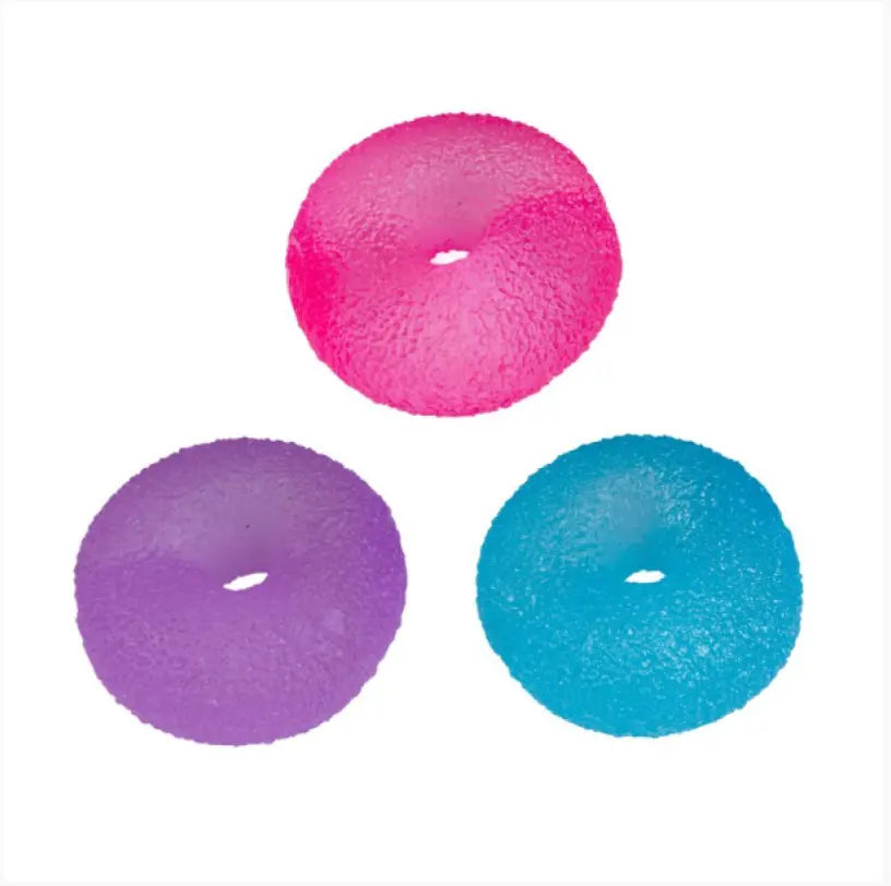 Three Smooshos super squeeze doughnut sensory toys in pink, purple and blue — Adventure Awaits