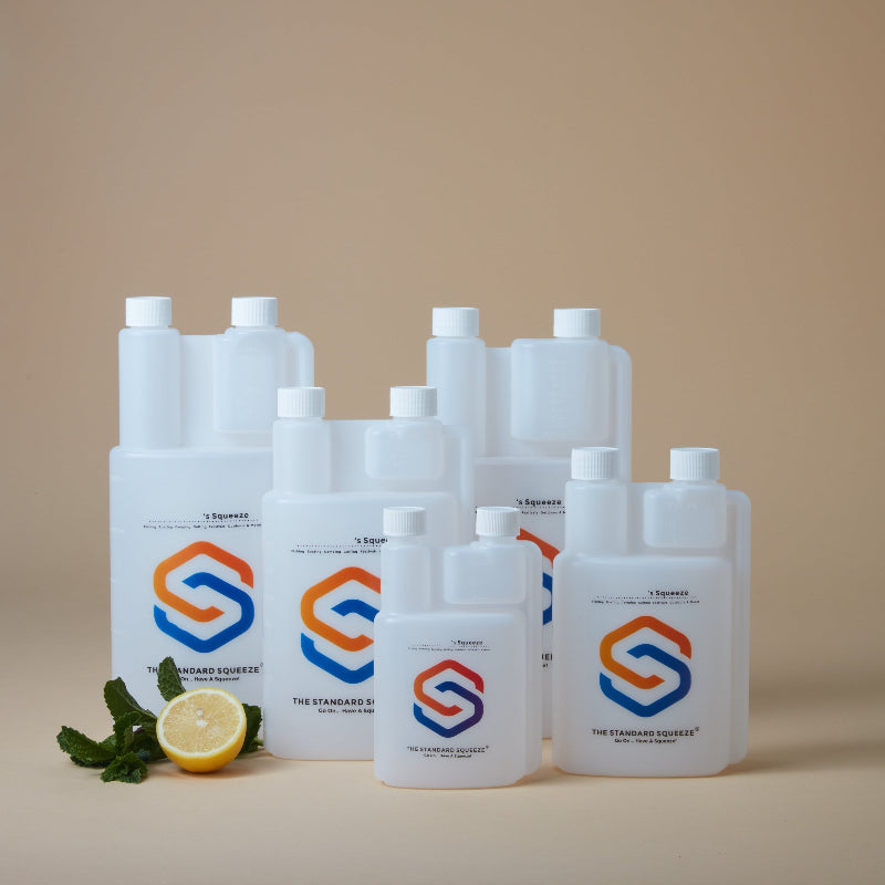 Range of white Standard Squeeze Bottles in assorted sizes with lemon and mint — Adventure Awaits