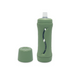 olive subo the food bottle shown with lid removed and sitting beside the bottle on a white background